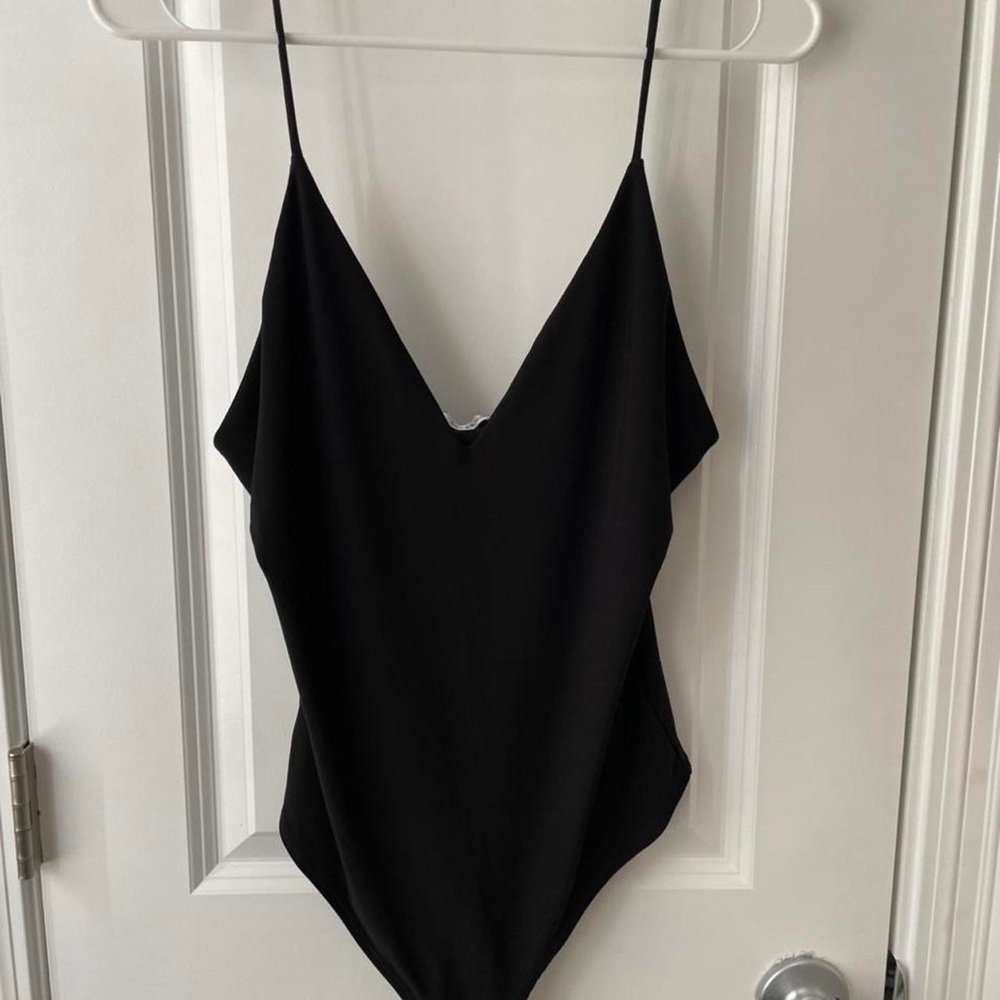 Miss Lola v-neck bodysuit. Never worn.